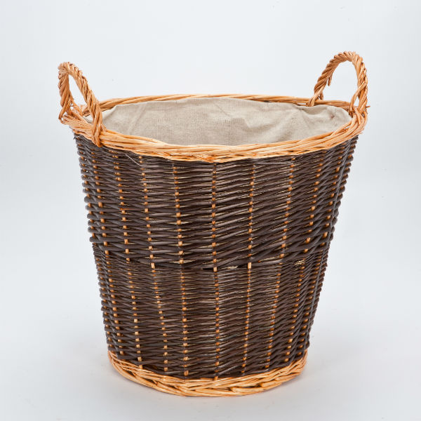 Circular willow basket with fixed linen liner.